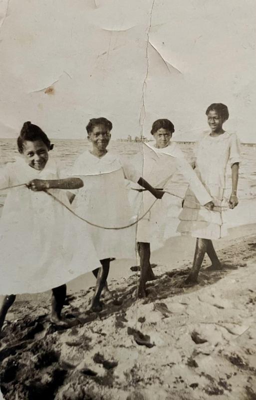 A photo from the recreation part of the exhibit shows four unidentified young girls on Lewes Beach in the late 1920s.
